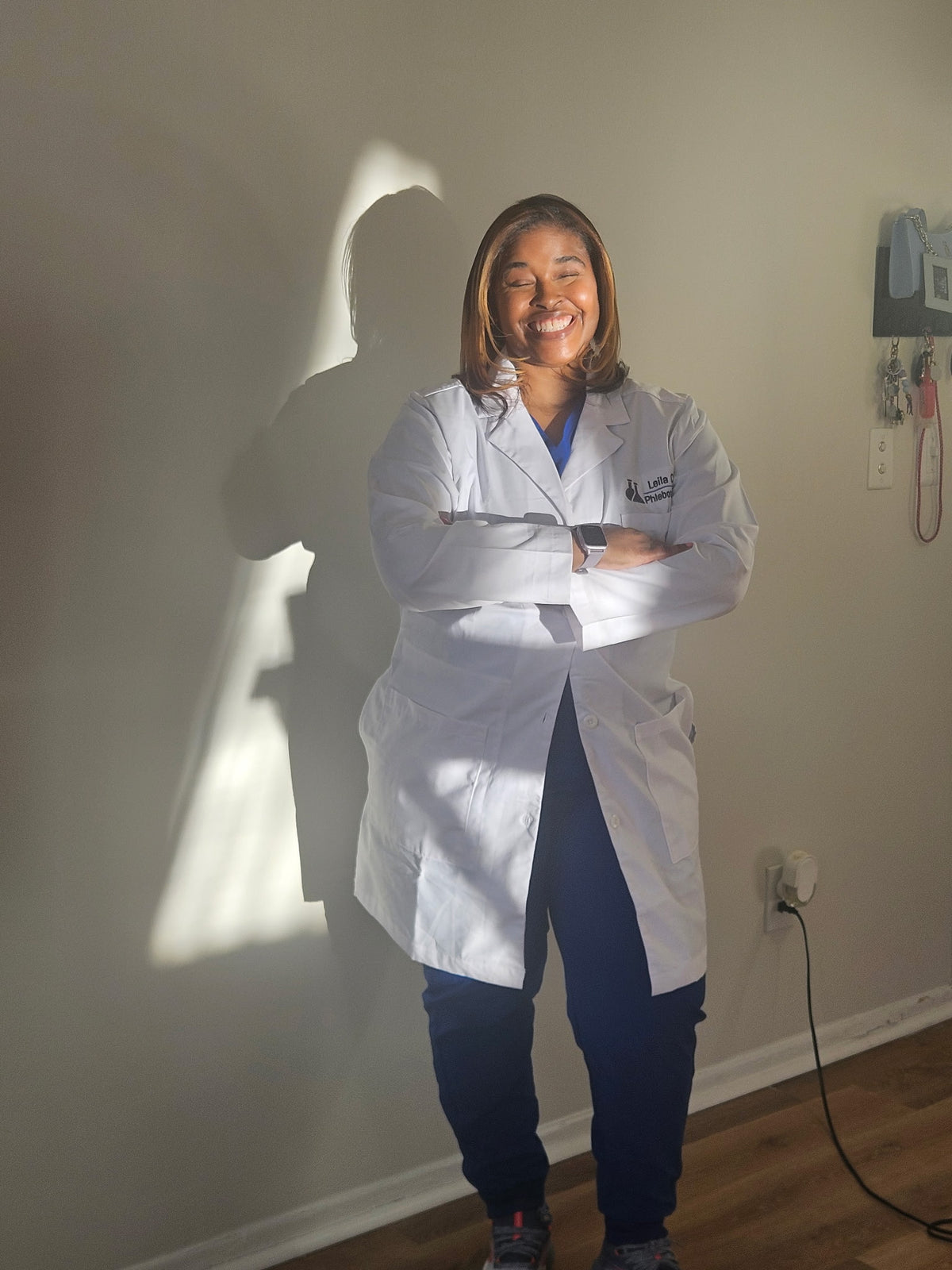 Mobile phlebotomist coordinating an appointment with a patient